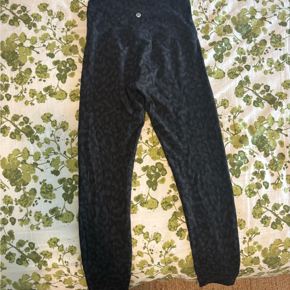 Lululemon leggings. Length 28. Size 6. Super tiny hole by seam. Not noticeable